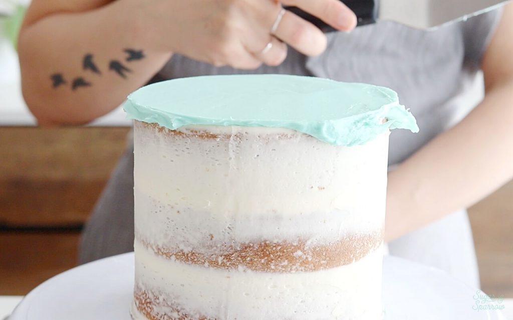 how to frost a cake with an angled spoon