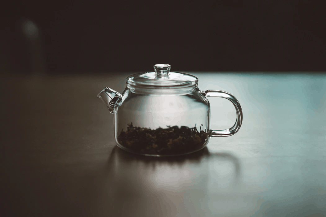 cannabis plant matter in glass tea pitcher