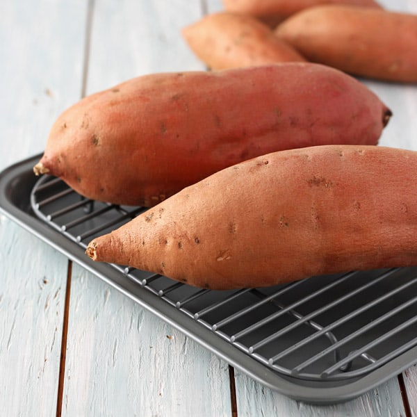 Raw sweet potato on the pan