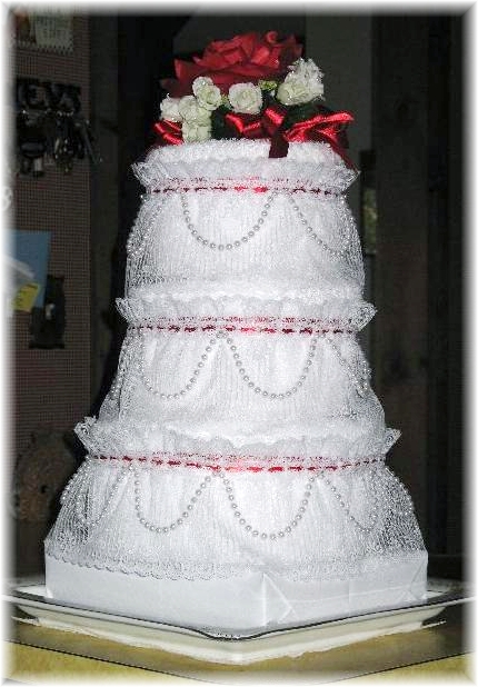 White and Pink Towel Cake
