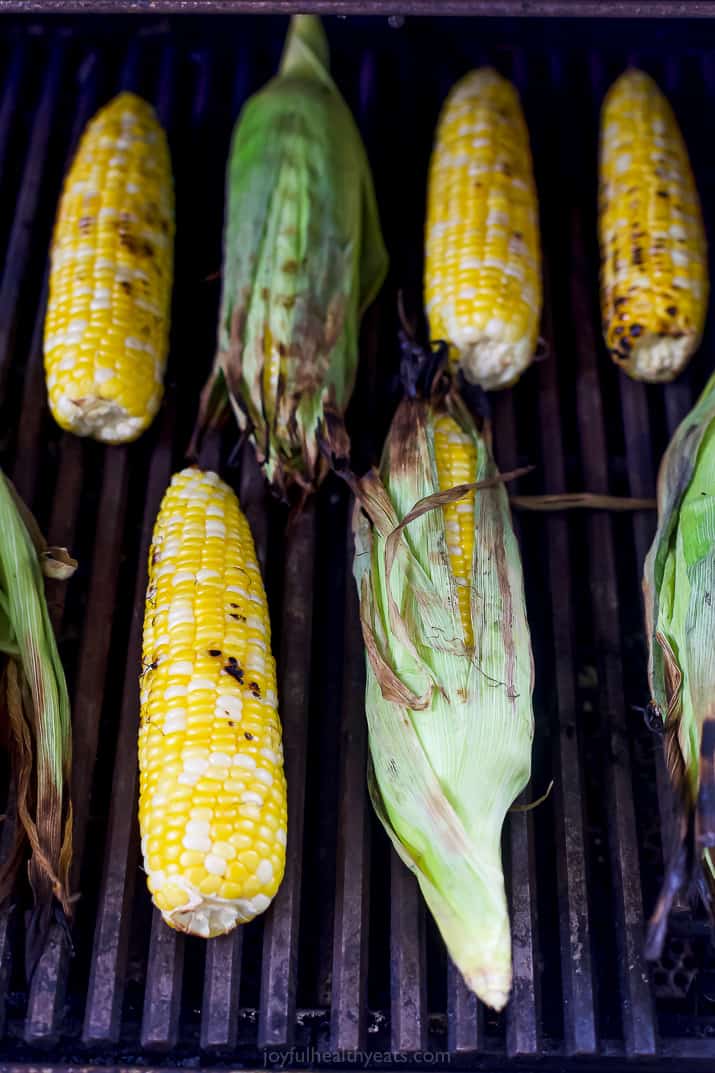 corn on the cob with and without husk on the grill