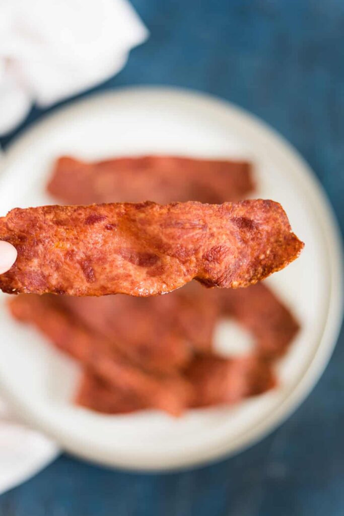 Turkey bacon cooked in an air fryer basket