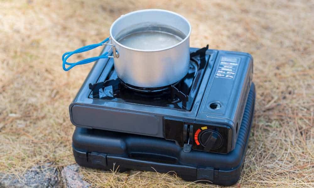 boiling water without electricity using a camp stove