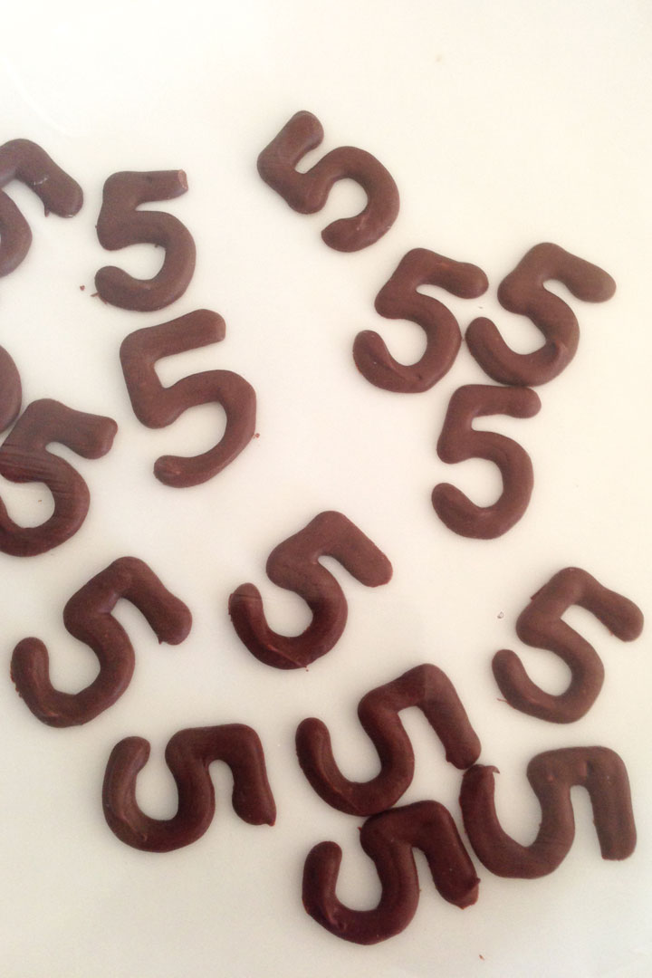 The number 5 appears with dark chocolate.