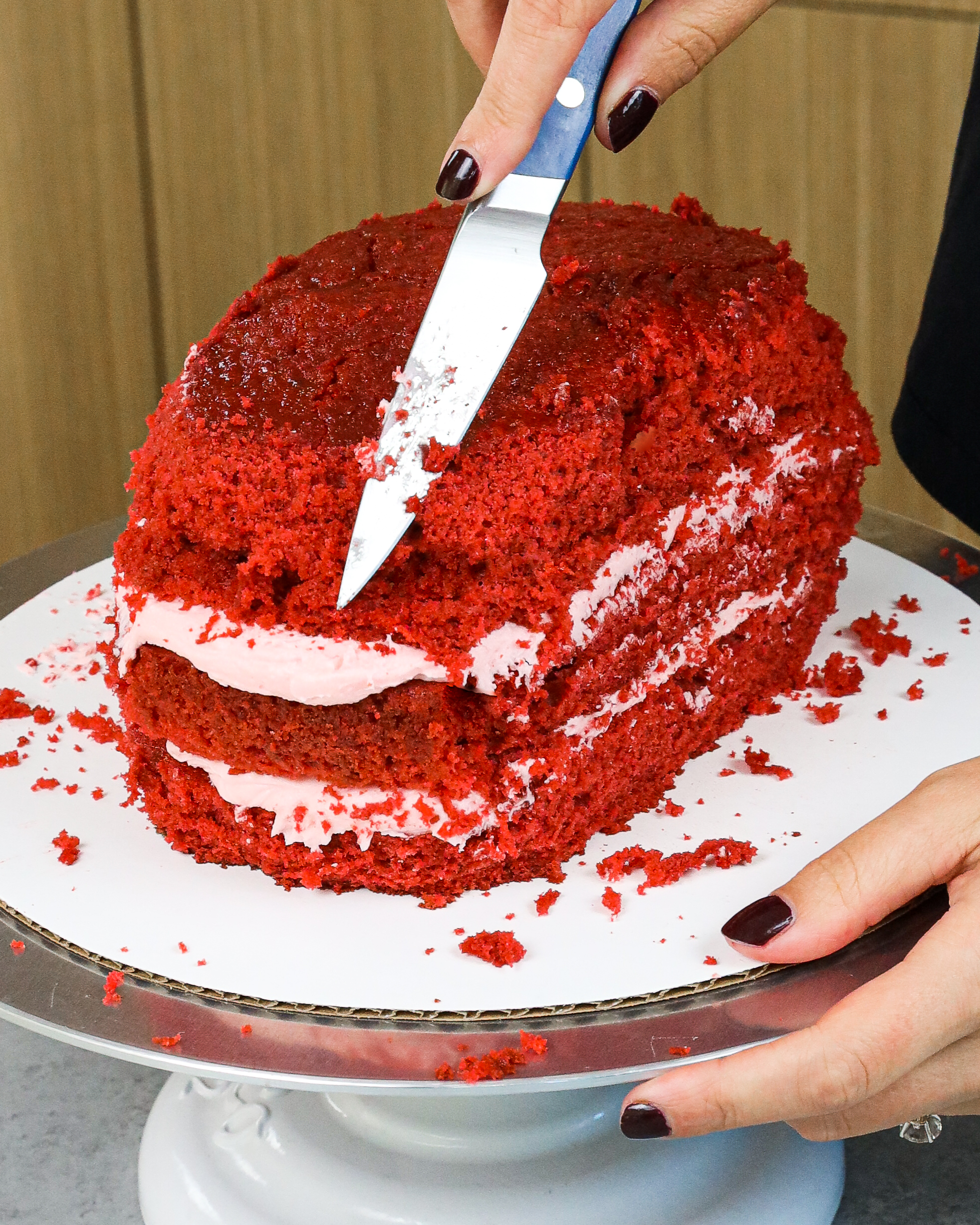 Image of edible fake blood made with raspberry jam scanned onto a brain-shaped cake for Halloween