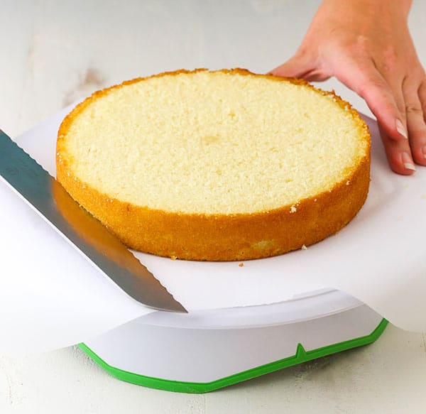 Use a serrated knife to cut the cake in half