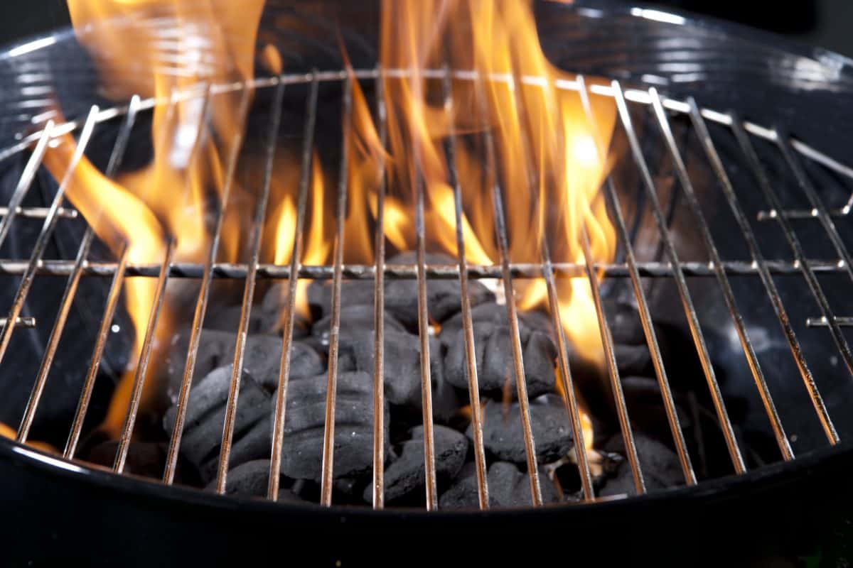Burn briquettes in a brand new charcoal oven
