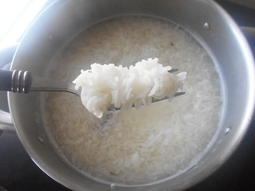 Fork full of cooked basmati rice