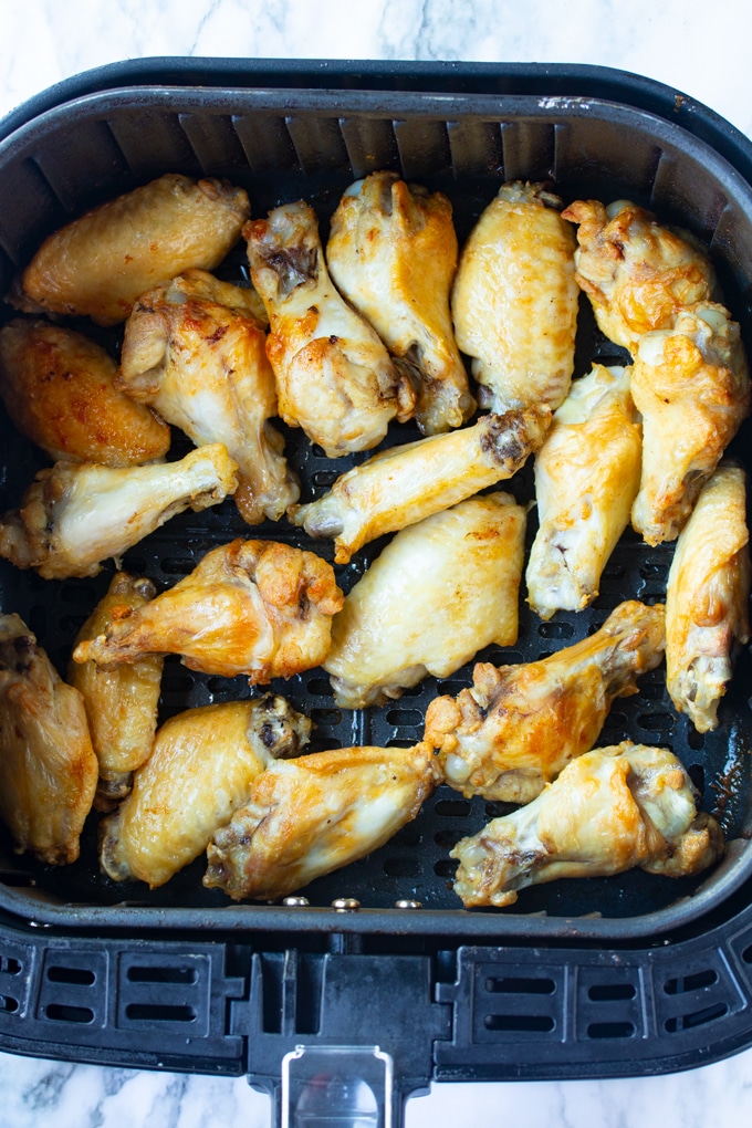 Chicken wings cooked in the air fryer basket