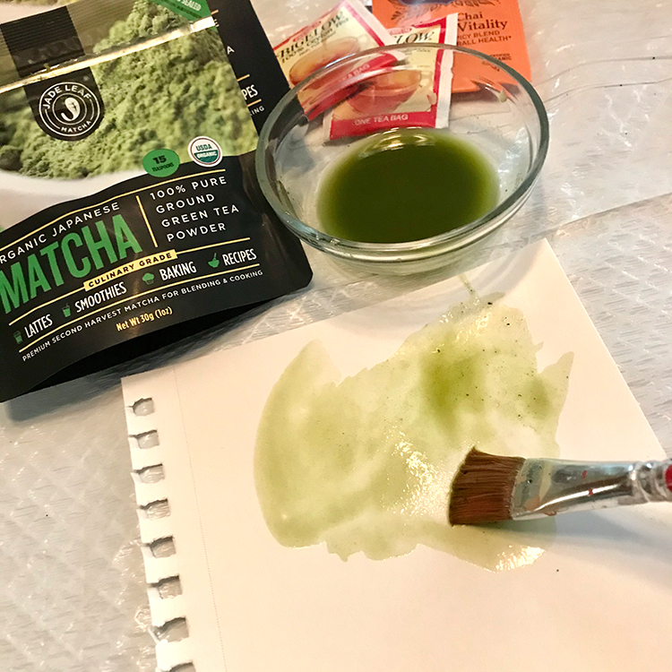 Use a brush to sweep matcha tea stains