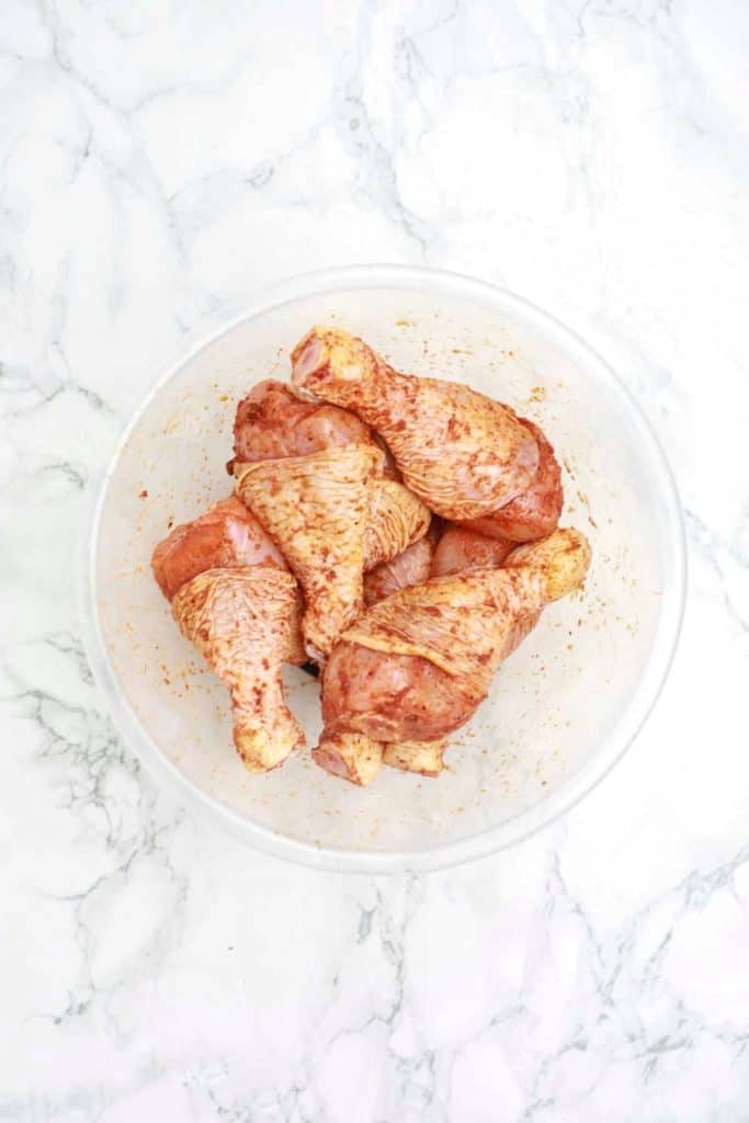 Place marinated chicken feet in a bowl.