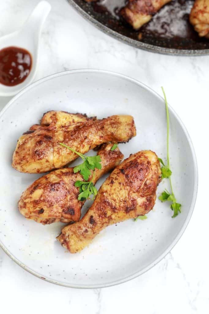 Place pan-fried chicken feet on a plate.