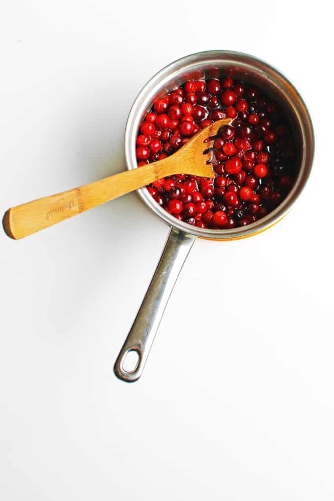Fresh cranberries cooked in a pot