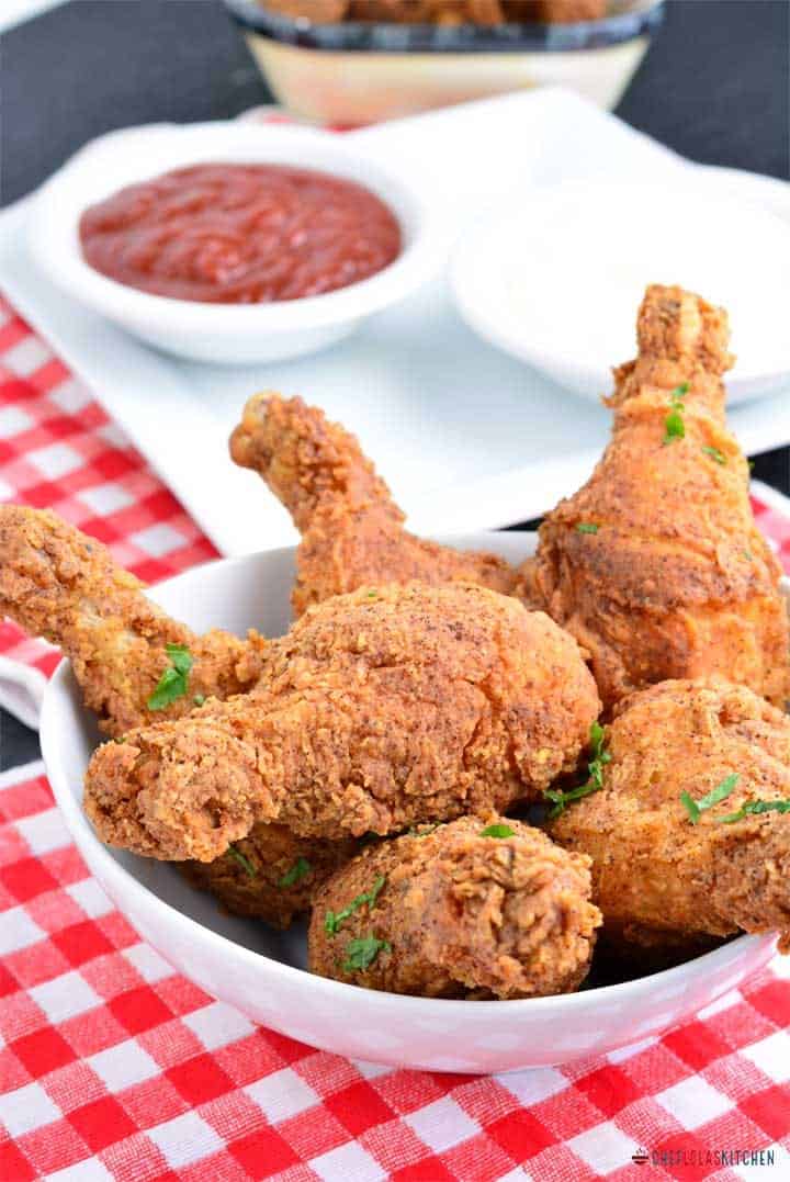 Crispy fried chicken thighs with tomato sauce