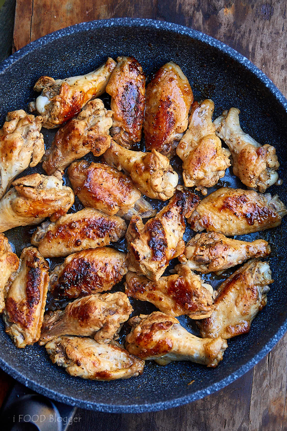 Learn how to fry chicken wings to make them super soft and fragrant. Try this recipe, you will love it. Chicken wings are first pan-fried, then cooked over low heat. All done in 30 minutes. | takeoutfood.best