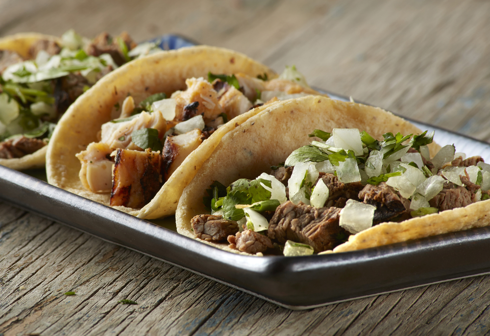 tacos kept on a serving plate on a wooden table san antonio riverwalk restaurants