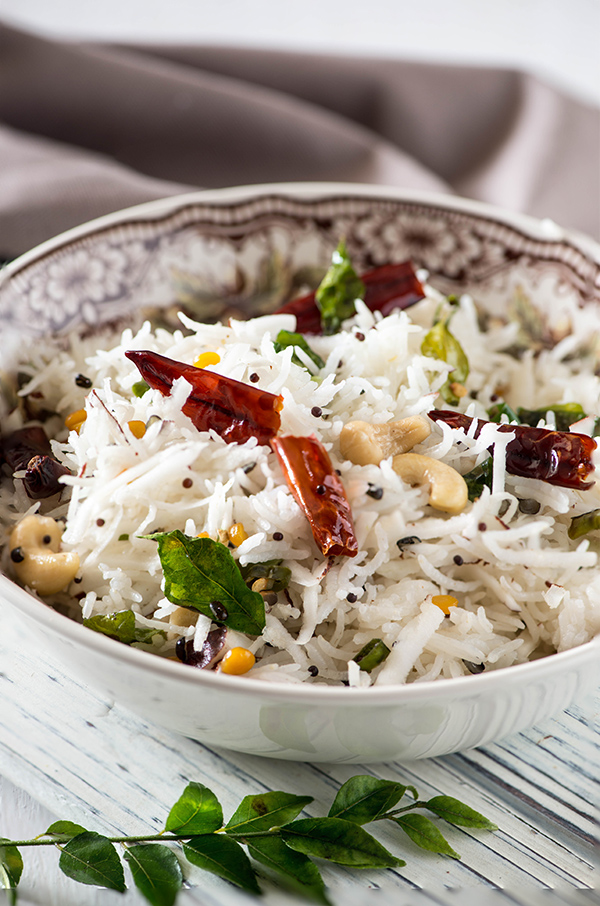 This coconut rice recipe is supple, fragrant and one of my favorite side dishes! These days I make it with an instant pot, an electric pressure cooker any other pressure cooker. All it takes is 20 minutes. Cooked with fresh grated coconut and full of flavor, it's the perfect accompaniment to any Indian curries.