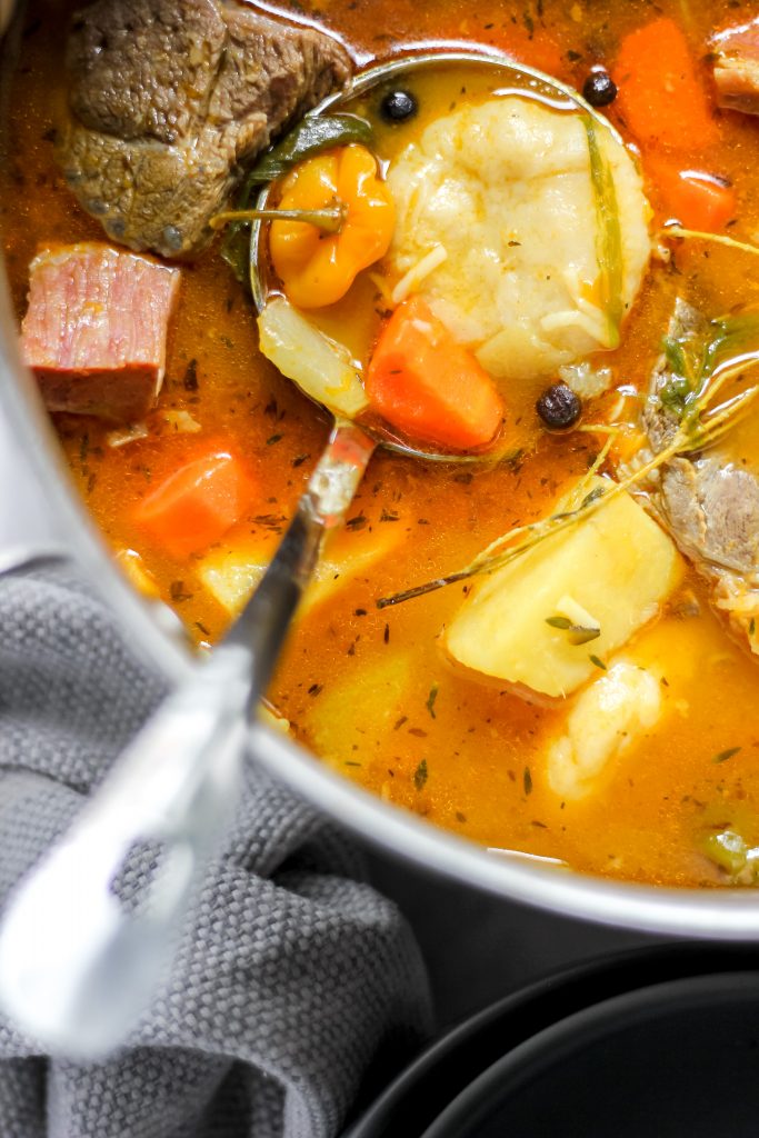 Traditional Jamaican Pumpkin Soup in Vegetable Bowl_Yellow Yam, Coco Yam, Chocho, Scotch Bonnet Pepper and Carrot