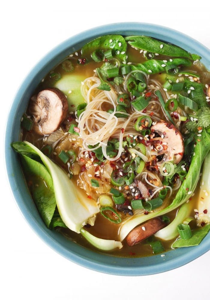 bowl of bok choy noodles with garlic mushrooms