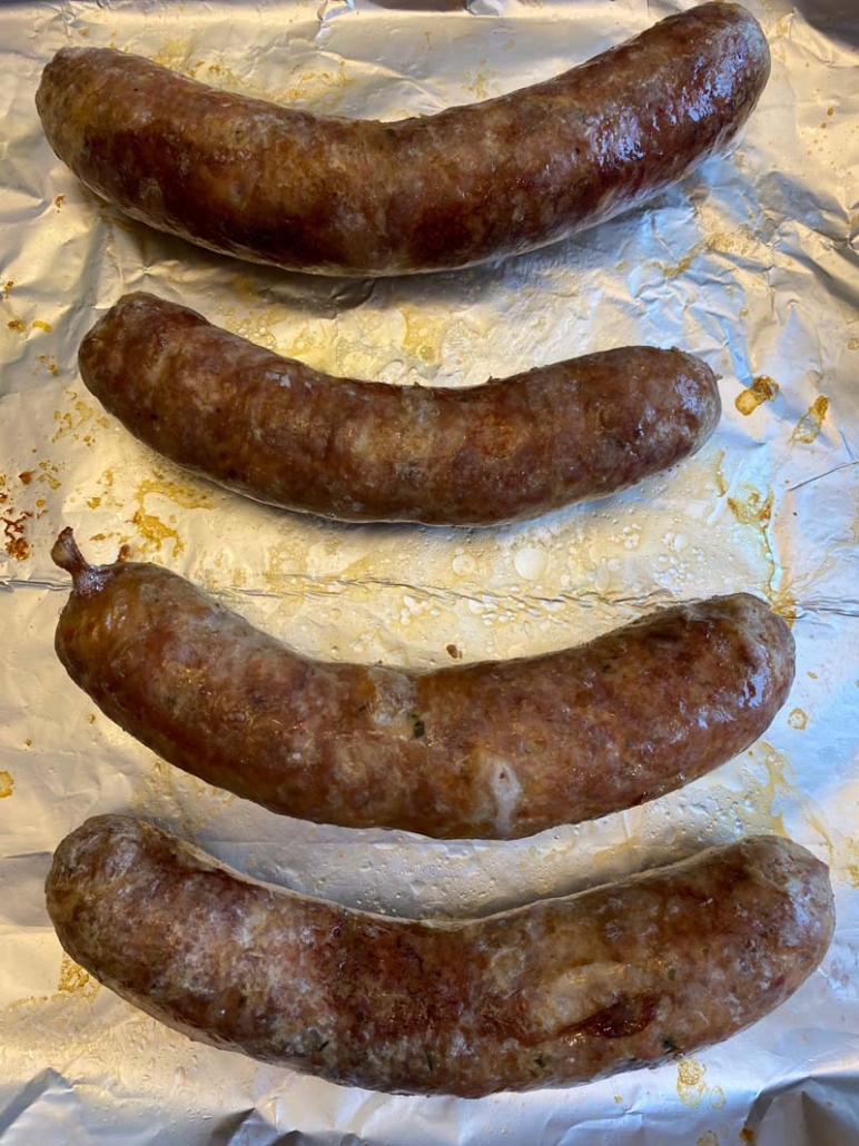 Italian sausage boiled in a pan