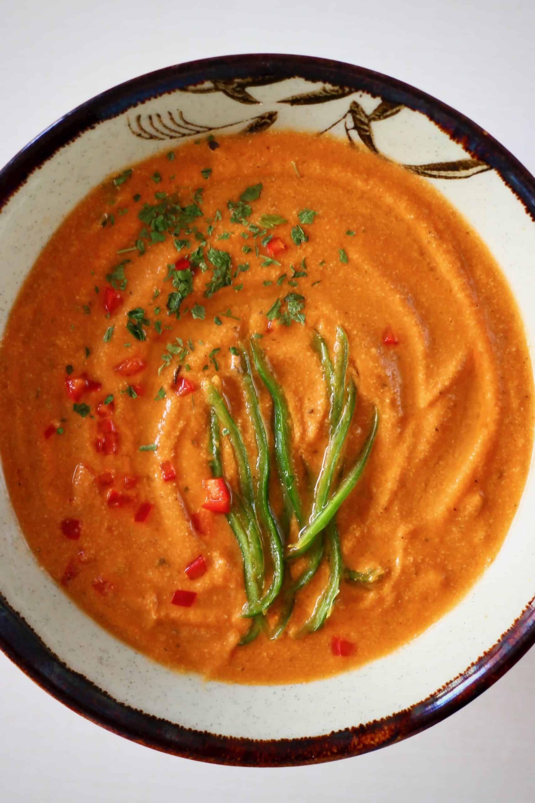 Vegan tortilla soup in a white bowl