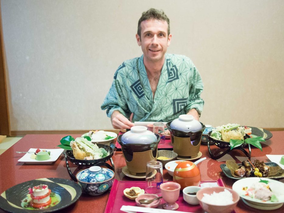 Simon wearing a yukata and enjoying our vegetarian feast in our ryokan room in Hakone