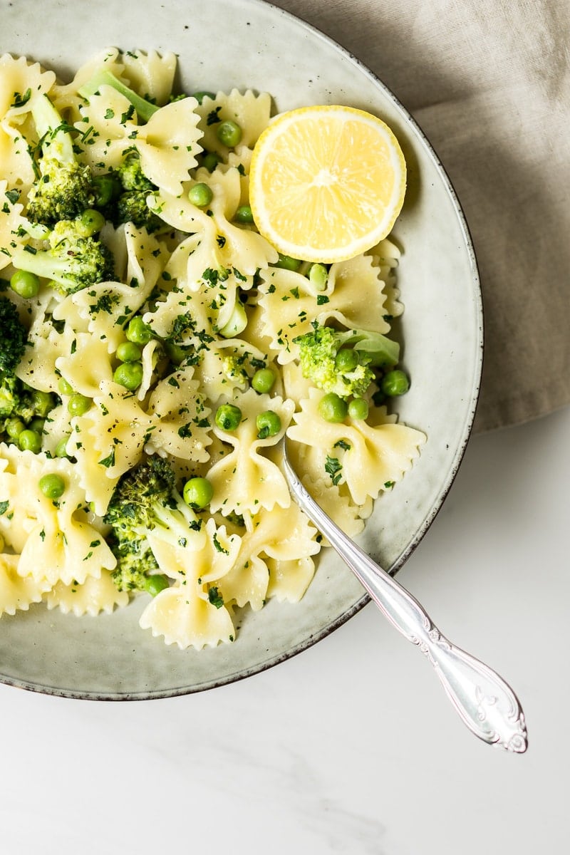 Bowl of pasta with a bow tie with a fork