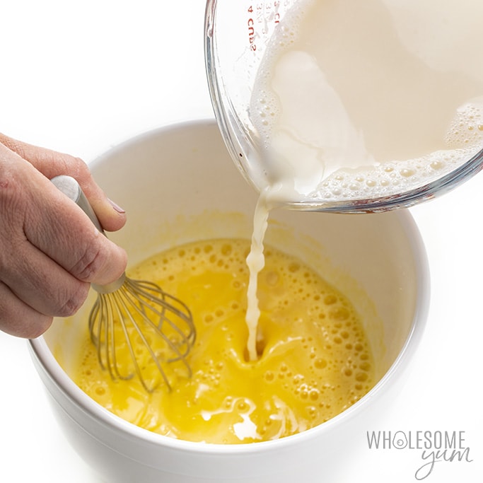 To warm the almond milk cream, pour hot almond milk into the egg yolks while whisking continuously