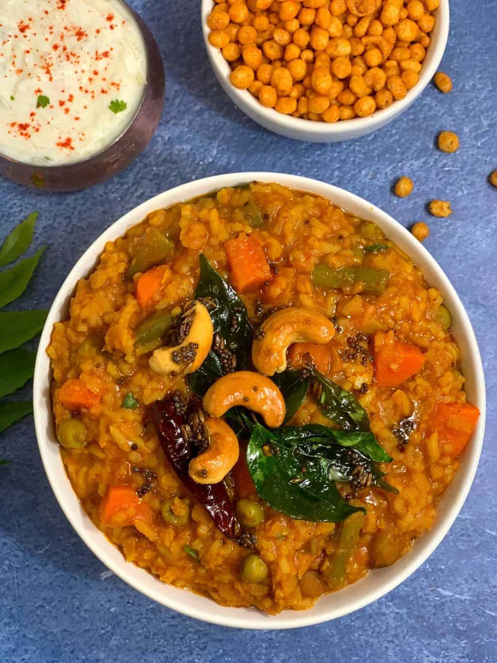 Instant pot biscuits served in bowls with boondi and raita on the side