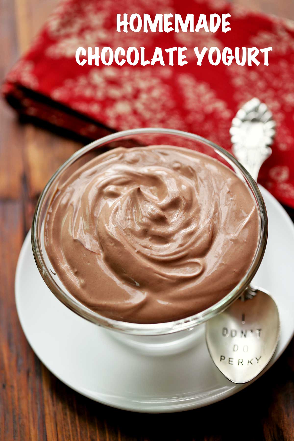 Use a spoon to scoop the chocolate yogurt into the bowl.