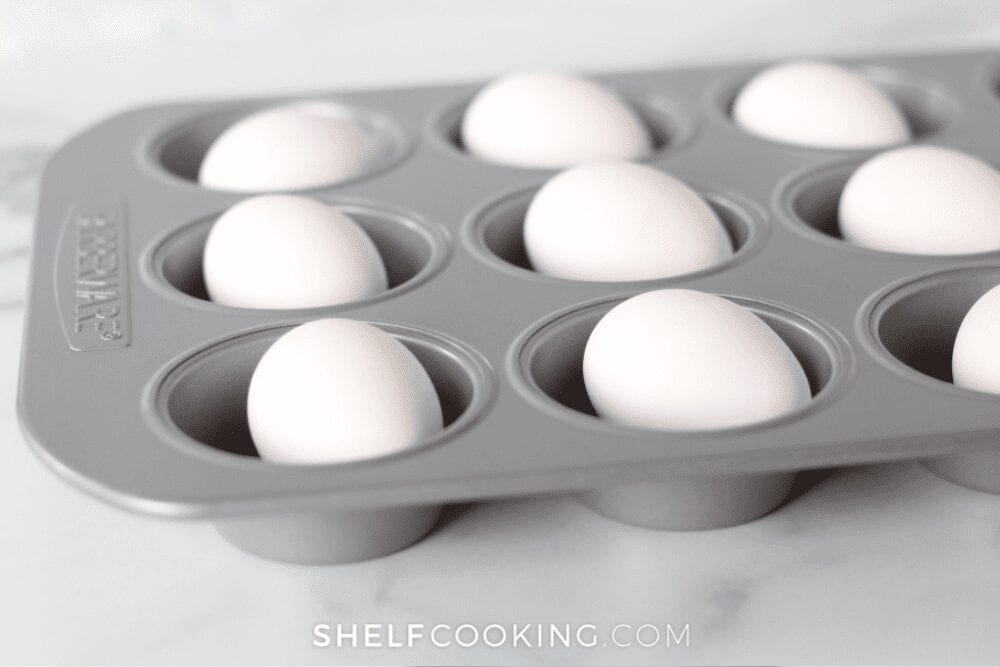 Eggs in a muffin pan, ready to bake, from Shelf Cooking