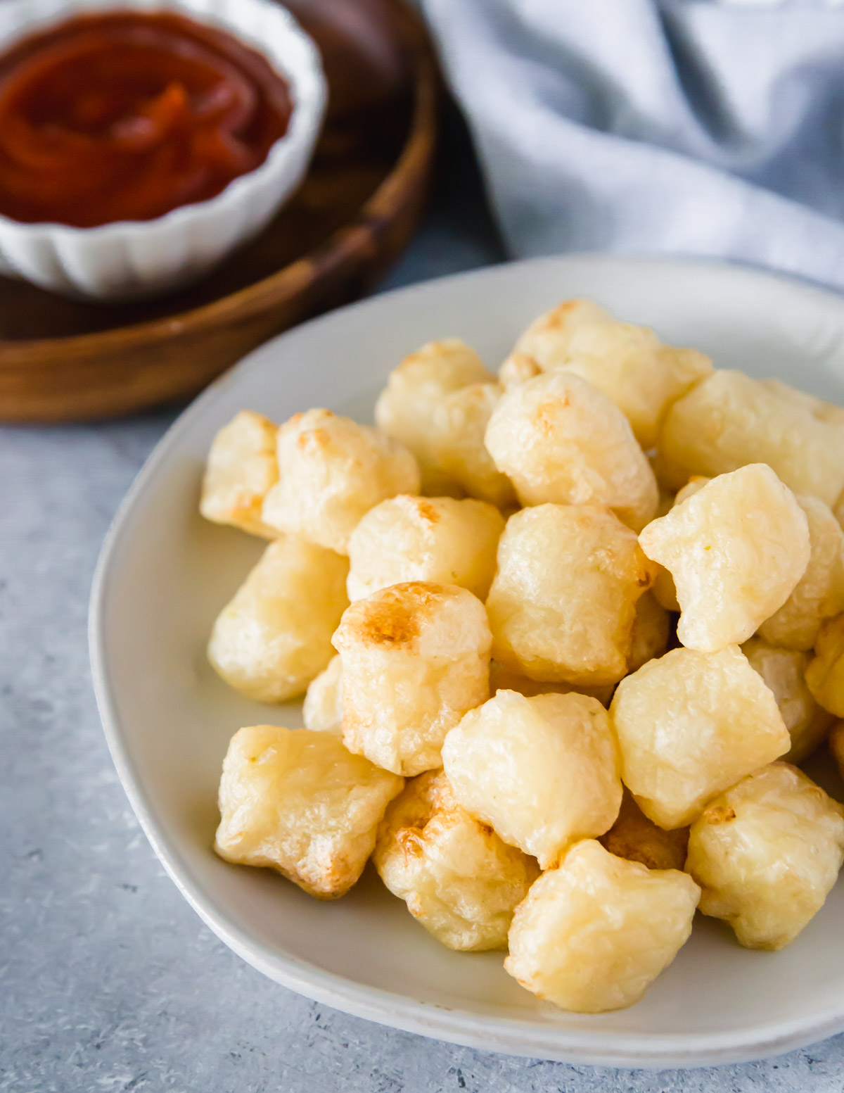 Crispy cauliflower gnocchi can be eaten as an appetizer, topped with your favorite condiments like ketchup.
