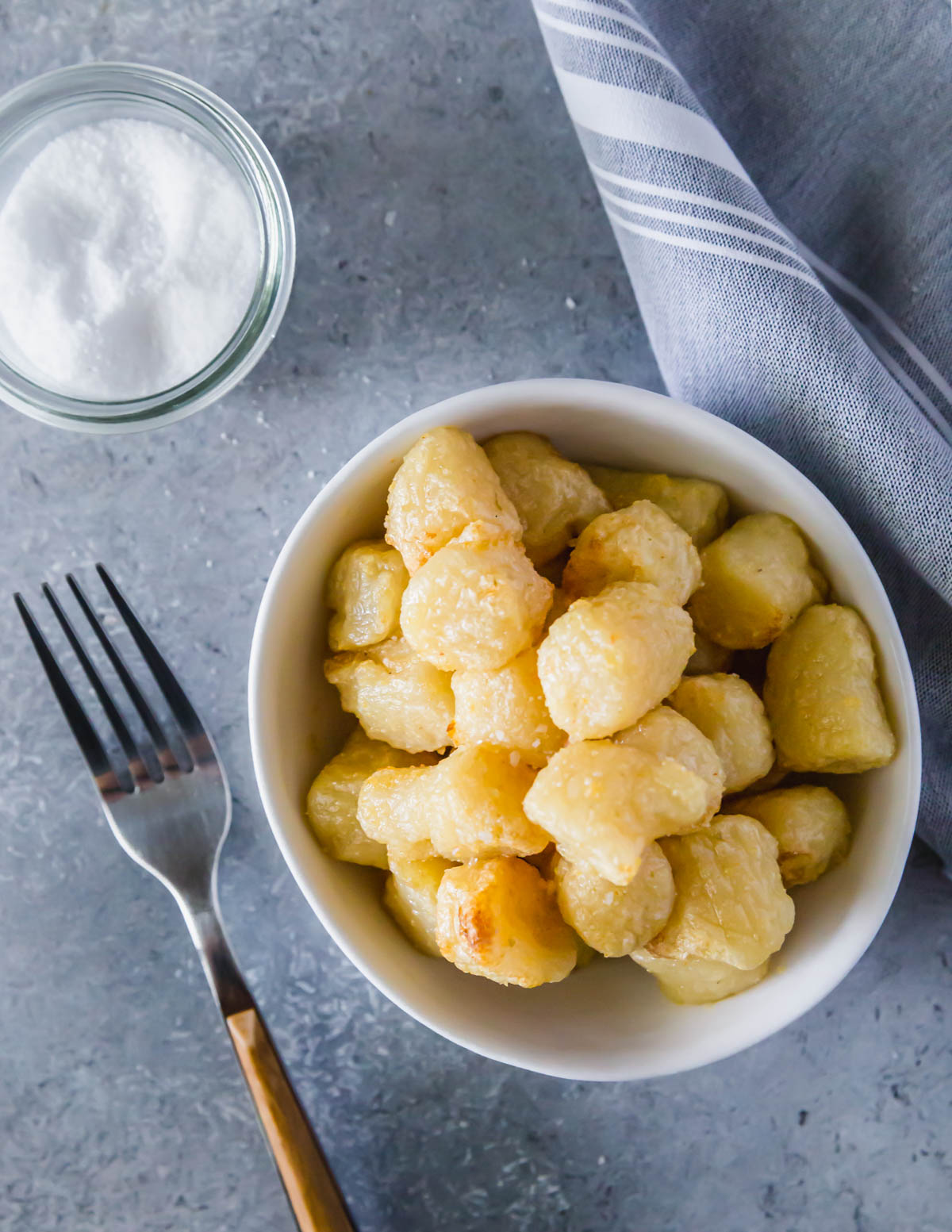 This simple air-fried cauliflower gnocchi with olive oil, garlic powder, and salt is an easy and delicious meal that's ready in just 20 minutes.