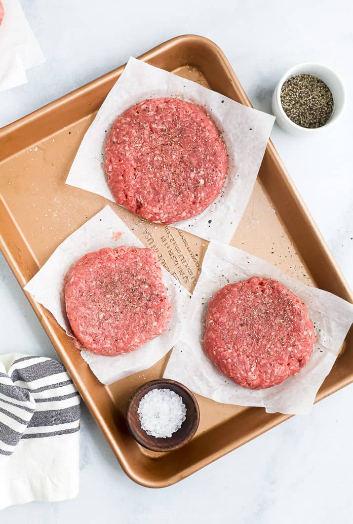 Hamburgers formed on a baking sheet