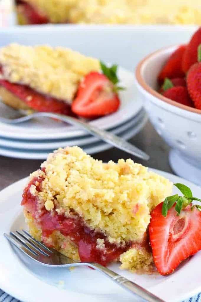 Strawberry cheesecake on a black plate