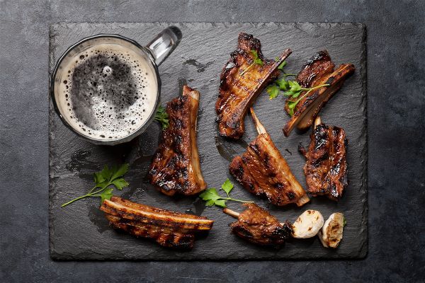Should you boil ribs before grilling?