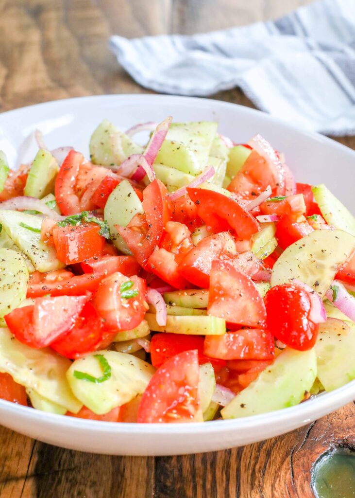 Cucumbers, tomatoes and onions make a perfect salad mix.