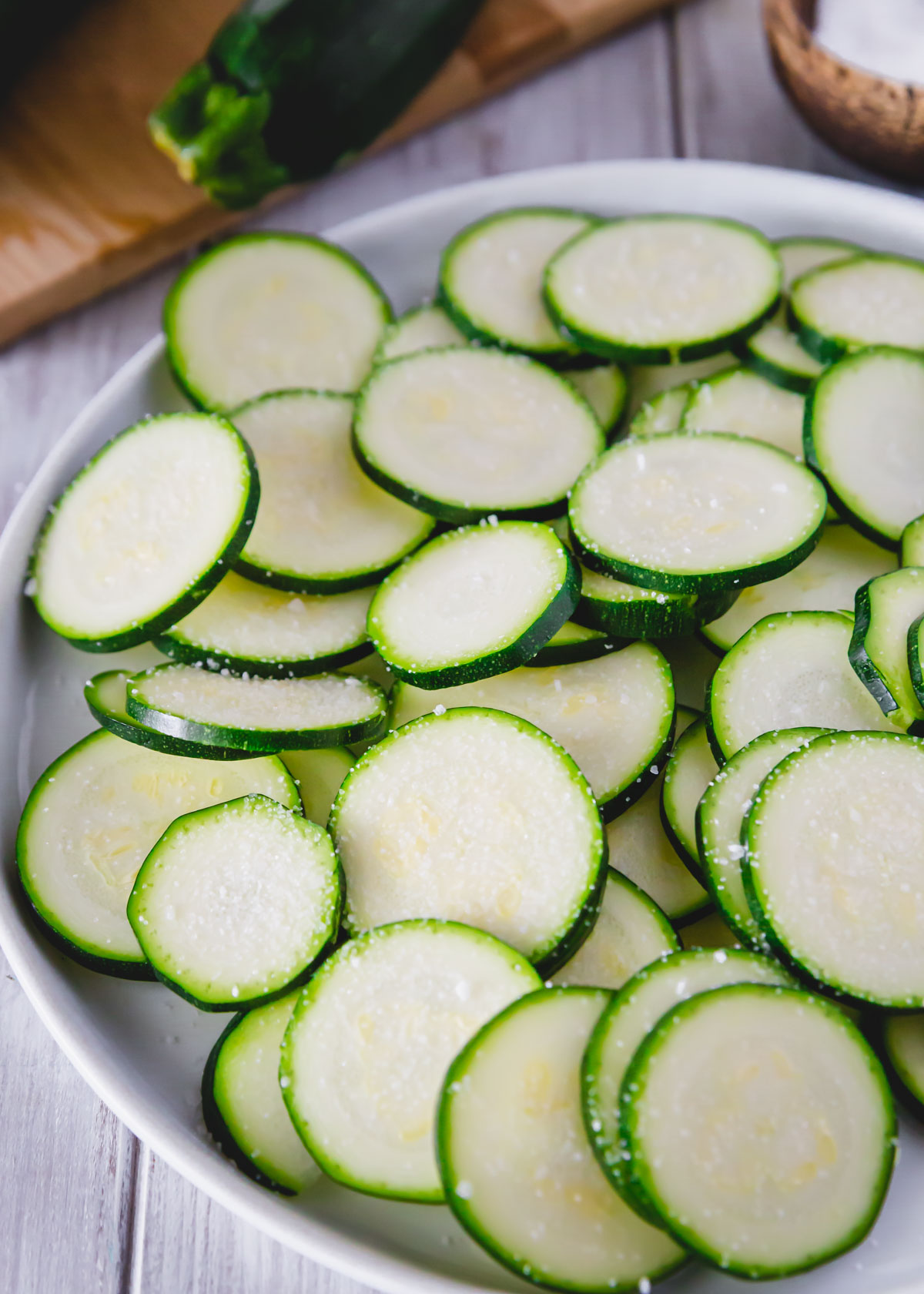 Slices of salted zucchini for crisps.