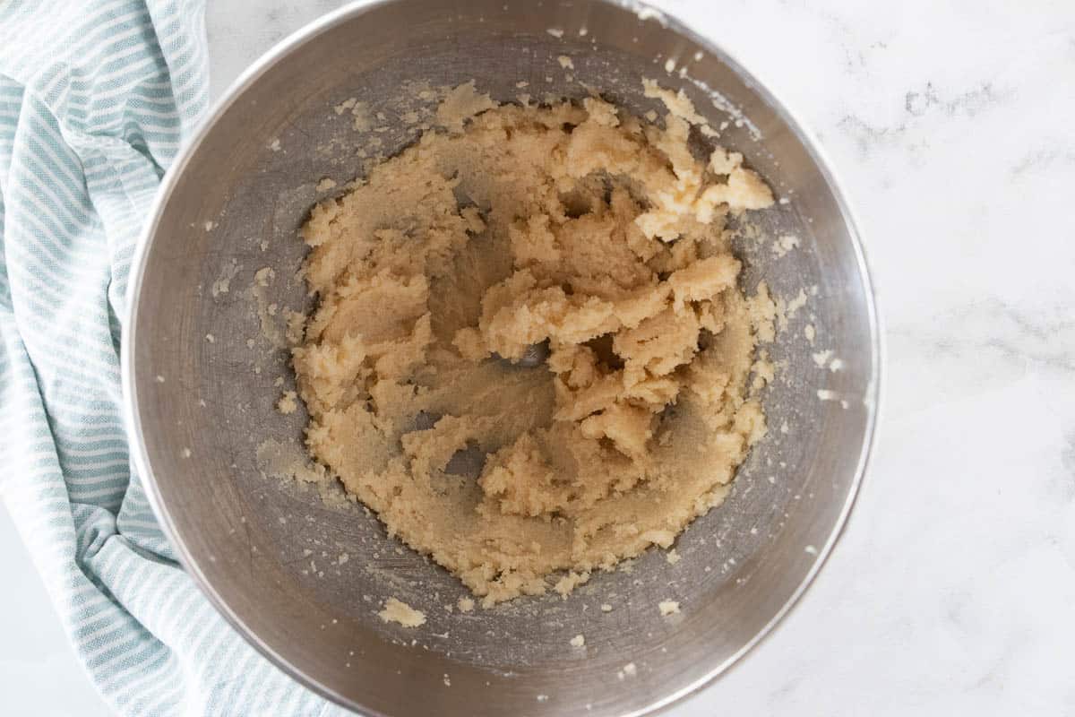 Cupcake dough is displayed in a mixing bowl.