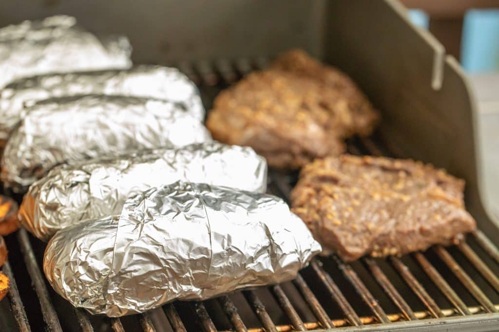 Baked potatoes wrapped in foil
