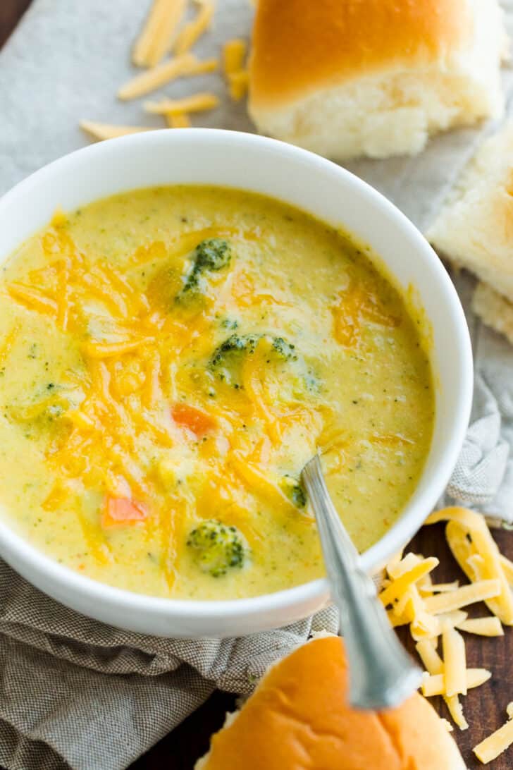 Panera Copycat soup recipe in bowl with spoon served with dinner dishes