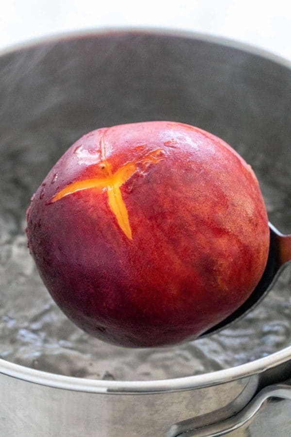 Peach in boiling water