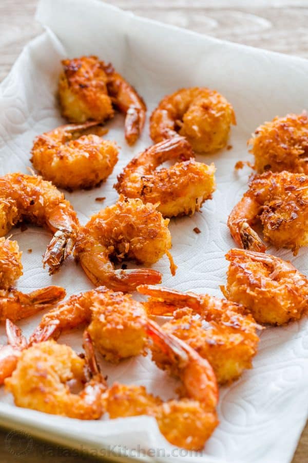 Cooked shrimp appetizer on a plate lined with paper towels