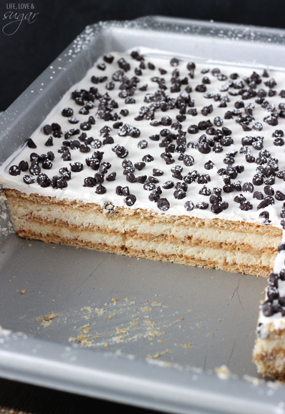 Cannoli Icebox Cake in a 9x13 pan with a few slices