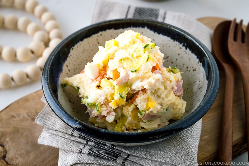 A porcelain bowl of Japanese potato salad.