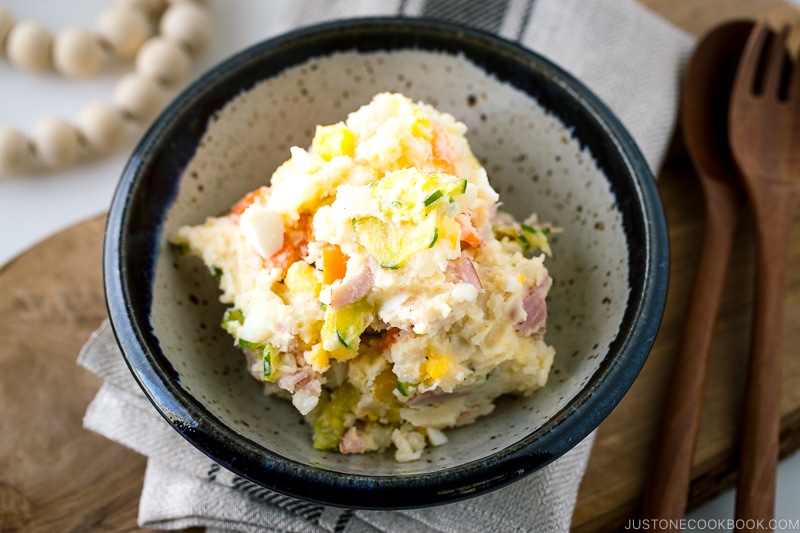 A porcelain bowl of Japanese potato salad.