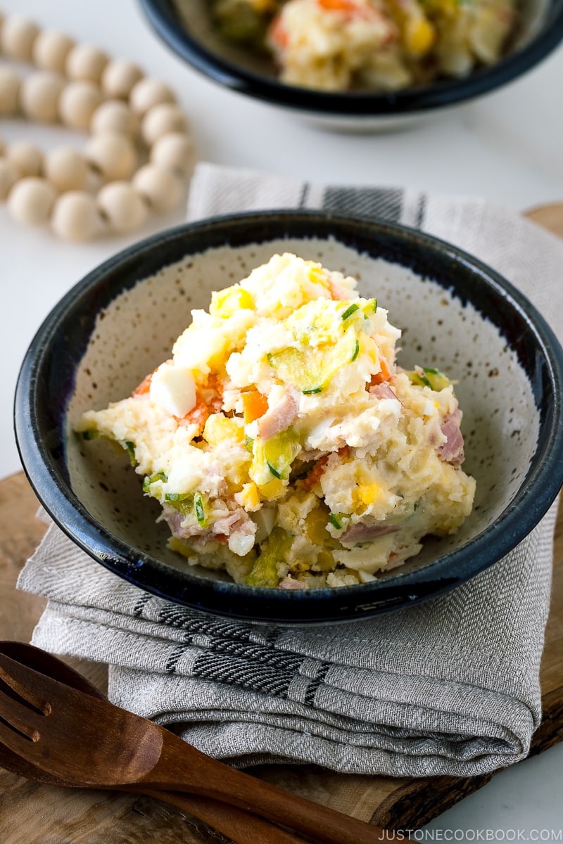 A porcelain bowl of Japanese potato salad.