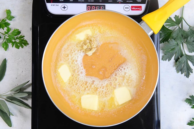 Add garlic to the pan.