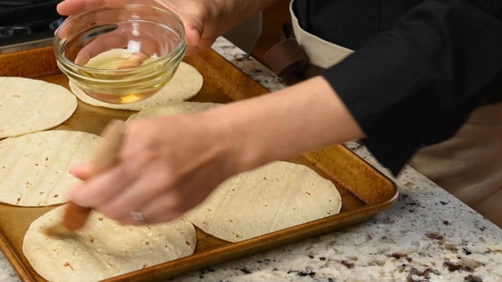 beat the corn tortillas with oil