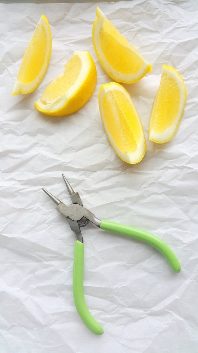 Slice the lemon with needle-nose pliers.